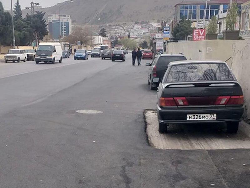 Maşını götürmədən yolu asfaltladılar - FOTO