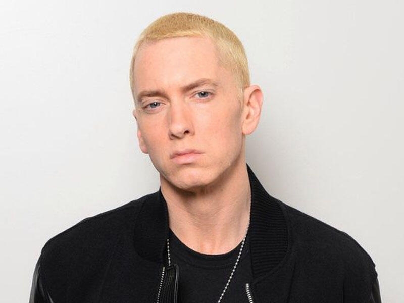 Eminemin pərəstişkarı bədəninə kumirinin 20 portretini çəkdi - FOTO