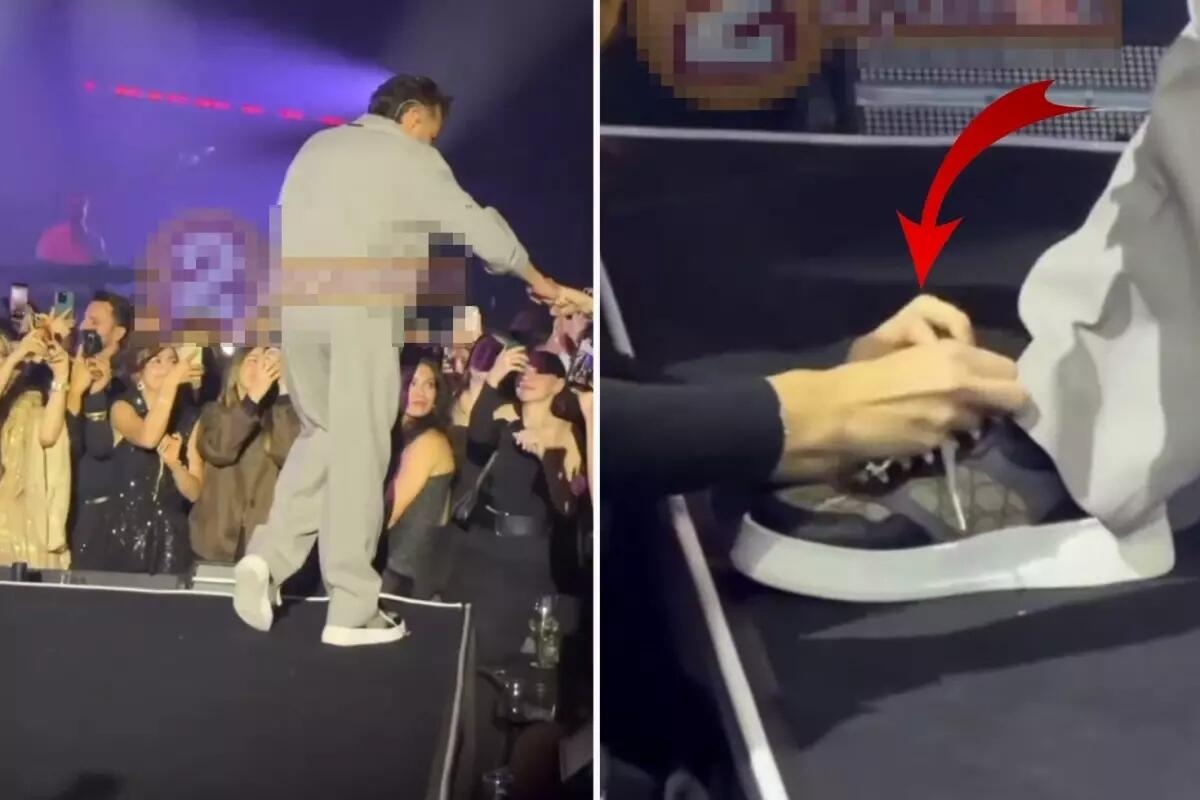 Səhnədə pərəstişkarına ayaqqabısını bağlatdırdı - VİDEO