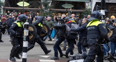 Amsterdamda polislə aksiya iştirakçıları arasında qarşıdurma