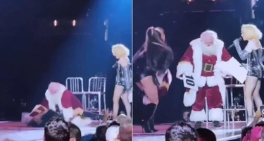 Madonnanın konsertində Santa Klausun başına oyun açdılar - VİDEO