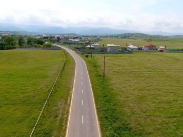 15 yaşayış məntəqəsini əhatə edən yol yenidən qurulub - FOTO