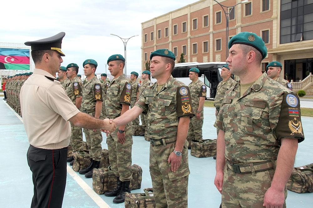 Əfqanıstandakı sülhməramlılarımızın bir qrupu Azərbaycana qayıdıb (FOTO/VİDEO)