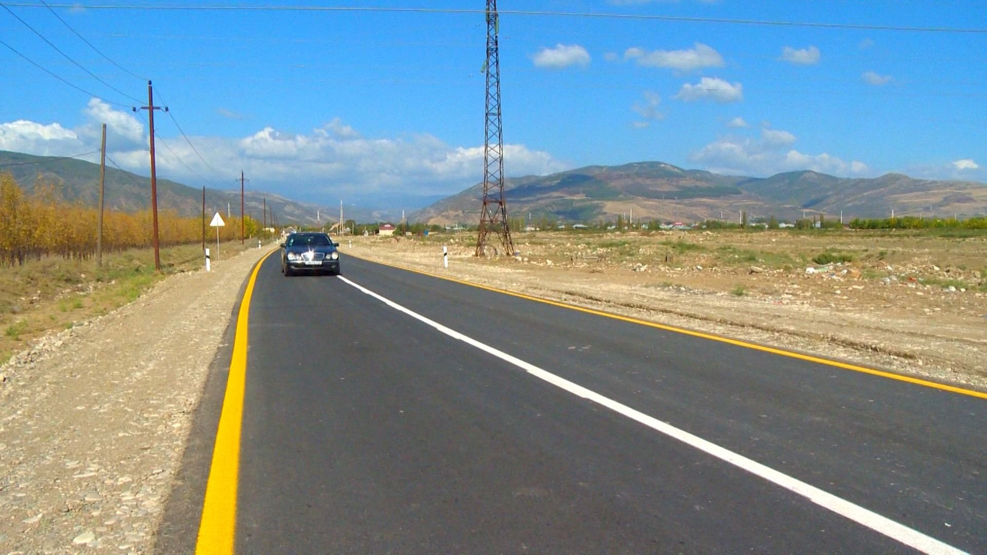 Ağsuda 9 yaşayış məntəqəsini birləşdirən yollar yenidən qurulub (FOTO)