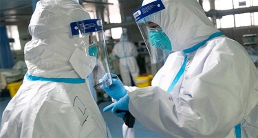 ÜST yeni koronavirusla yoluxma riskinin qiymətləndirilməsini qaldırıb