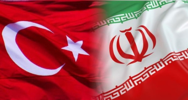 Ruhani: İran və Türkiyə arasında ticarət davam etməlidir